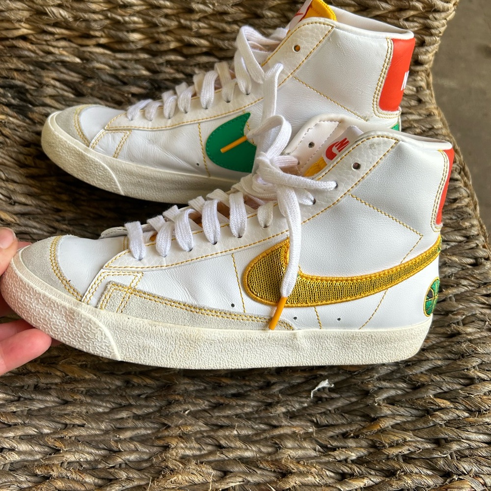 White High-Top Sneakers with Gold and Green Accents